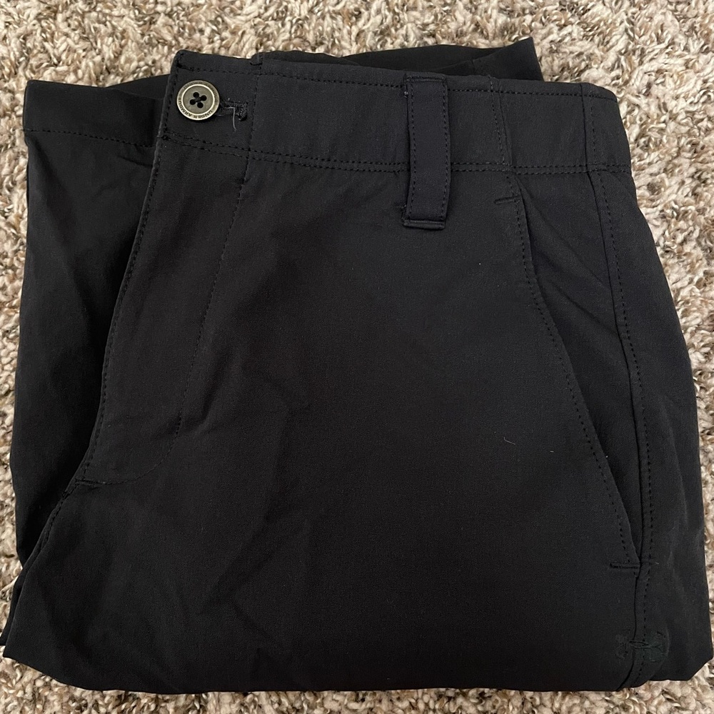 Men’s golf shorts from Under Armor, black, size 30 waist.